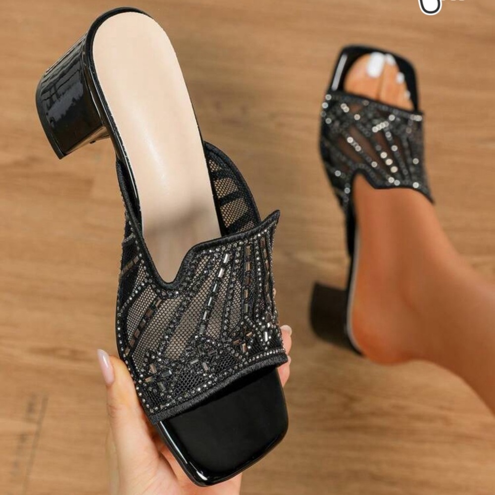 High heeled sandals, black. New in box.